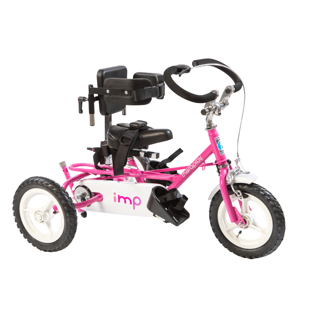 Theraplay IMP tricycle in pink with black postural supports and handlebar, shown in side view.